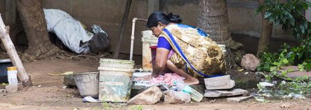 PONDICHERY, PUDUCHERRY, TAMIL NADU, INDIA - SEPTEMBER CIRCA, 2017. Unidentified Indian poor woman...