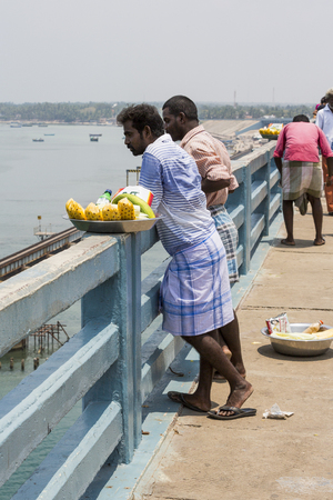 Unidentified local people saling street food on the road on the bridgeのeditorial素材
