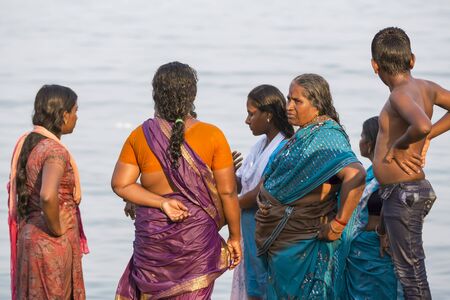 RAMESHWARAM, TAMIL NADU, INDIA- MARCH CIRCA 2018. At the gate, Unidentified Hindu pilgrims people ready to go to the bath in the Arabian Sea before entering the temple. Great time of all the familiesのeditorial素材