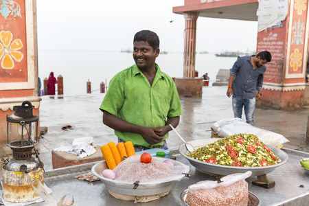 RAMESHWARAM, TAMIL NADU, INDIA - MARCH CIRCA, 2018. Unidentified Indian trader in his shop on local...