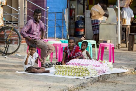 RAMESHWARAM, TAMIL NADU, INDIA - MARCH CIRCA, 2018. Unidentified Indian trader in his shop on local...