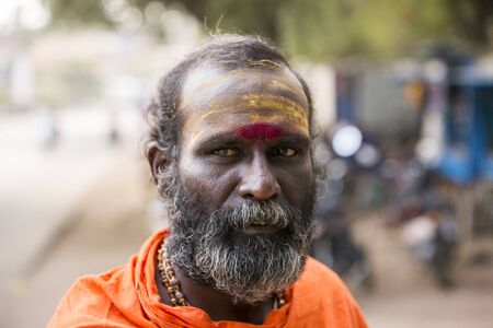 TIRUVANNAMALI, TAMIL NADU, INDIA - MARCH Circa, 2018 . Portrait Sadhu at Ashram Ramana Maharshi. Sadhu is a holy man, who have chosen to live an ascetic life and focus on the spiritual practice of Hinduism. Sage, Moksha, Maya, caste, Shiva, Vishnou, gymnoのeditorial素材