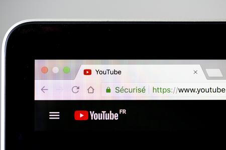 YAINVILLE, FRANCE - SEPTEMBER 18, 2018. Youtube home black page sharing service on laptop screen close-up. Internet international serviceのeditorial素材