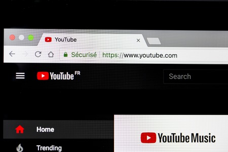 YAINVILLE, FRANCE - SEPTEMBER 18, 2018. Youtube home black page sharing service on laptop screen close-up. Internet international serviceのeditorial素材