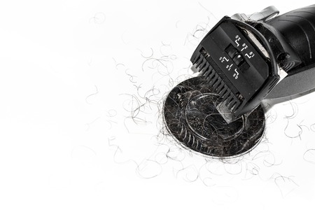 Electrical black shaver over white background in the wash basin. Close-up. Beauty care conceptの写真素材