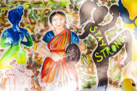 For the international woman day, unidentified girl students are painting outdoor symbols of woman day. Freedomのeditorial素材