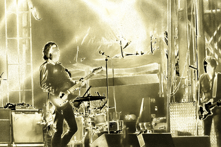 Soft motion blur blurred creativity filter rock band vocalist singer performing on stage music. Guitarist bass guitar drum saxophone. Scene light. Authentic shooting whith high iso in challenging lighting conditionsの写真素材