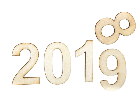 Close up 2018 to 2019 year celebrate with wooden numbers on white background. Clean, cleaned, purity design. Copy spaceの写真素材