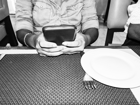 Young woman adult student. People communication and risk of technology concept. Lack of real communication. Power of virtual.の写真素材