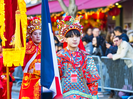 PARIS, FRANCE - FEBRUARY 17, 2019. Last day of the chinese new year celebration festival in street. Portrait of people show with colorful costumes and decorations. 200 thousands, multi ethnic asian caucasian man woman. Year of pigのeditorial素材