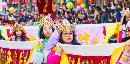 PARIS, FRANCE - FEBRUARY 17, 2019. Last day of the chinese new year celebration festival in street. People dragon lion dancing show colorful costumes. 200 thousands, multi ethnic asian man woman. Year of pigのeditorial素材