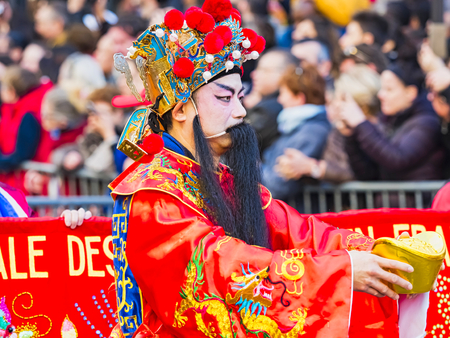 PARIS, FRANCE - FEBRUARY 17, 2019. Last day of the chinese new year celebration festival in street. Portrait of people show with colorful costumes and decorations. 200 thousands, multi ethnic asian caucasian man woman. Year of pigのeditorial素材