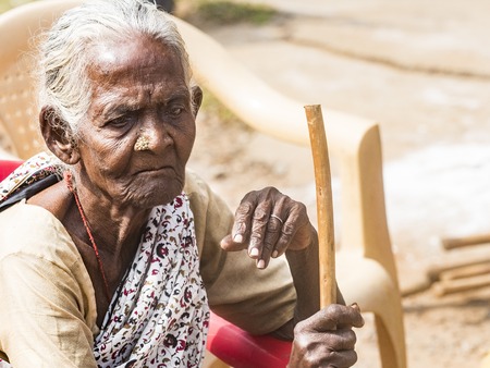 PUDUCHERY, INDIA - DECEMBER Circa, 2018. Unidentified rural woman with saree dress in traditional...