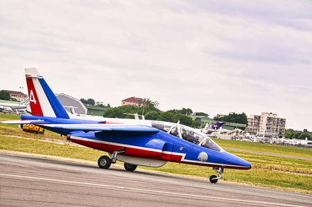 LE BOURGET, FRANCE - June 24, 2017. Flying display and aerobatic show on floor of the french Patrouille de France team at International Airshow aerobatics aeronautical and spatial meeting.のeditorial素材