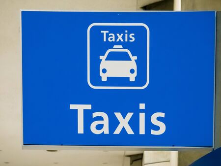 Blue taxi sign board at Paris airport, Franceの写真素材