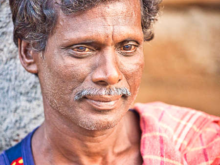 PUDUCHERRY, INDIA - DECEMBER Circa, 2018. Portrait of indian 40-50 years man with smiling face, in...