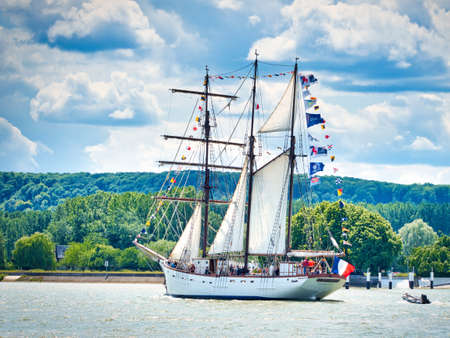 ROUEN, FRANCE - JUNE Circa, 2019. Armada exhibition at Rouen, international meeting. Sailboat Le Marite Three masted schooner made in Normandy on the Seine River, with cloudy skyのeditorial素材