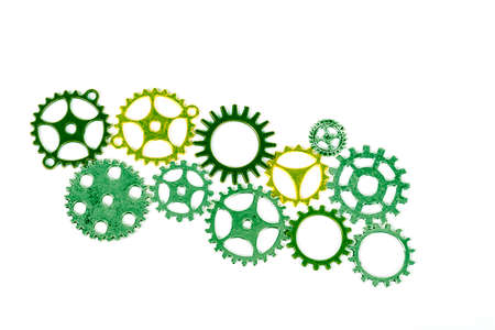 A large group of rusty transmission gears linked together on a white background. Transmission...