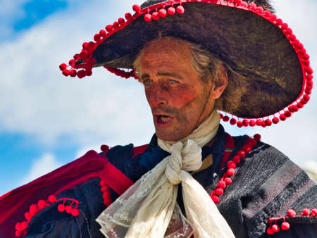 YAINVILLE, FRANCE - JULY Circa, 2019. Actor man in historical pirate costume making a show outdoors,...