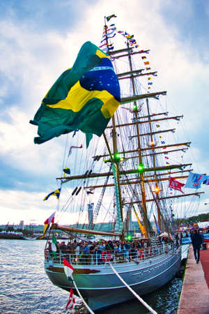 ROUEN, FRANCE - June Circa, 2019. The white swan Cisne Branco, brazilian sailboat, is parked on the dock of Seine river. Owned by brazilian navy since 2000. Three masted square rigged ship for rare elegance. Nautical eventsのeditorial素材