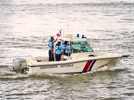 YAINVILLE, FRANCE - JULY Circa, 2019. Rescue team on dinghy on the Seine river afor Armada...