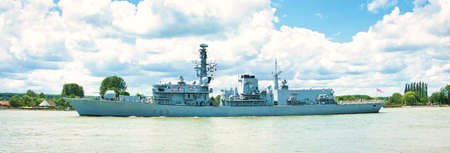 ROUEN, FRANCE - JUNE Circa, 2019. HMS St Albans, a Type 23 frigate of the Royal Navy, on the Seine...