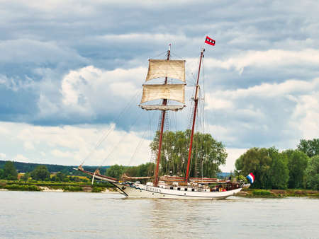 ROUEN, FRANCE - JUNE Circa, 2019. Sailing ship JR Tolkien on the Seine river in France, for Armada exhibition sailsboats international meeting. Almost perfect lines dutch schooner, cruise ship in Balticのeditorial素材