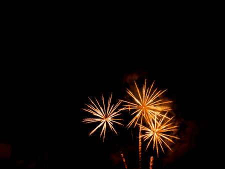 Burning sparklers on black background. Small fireworks giving off sparks of fire. Sparks explosion....