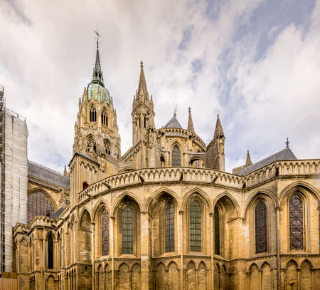BAYEUX, FRANCE - SEPTEMBER Circa, 2020. Exterior of Cathedral Notre Dame, gothic church built in 1862. Famous place for tourists to visitのeditorial素材