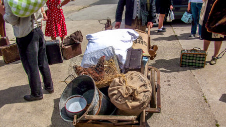SAINTE MERE L'EGLISE, FRANCE - JUNE 6, 2019. Parade of People dressed up in 1940's clothing posing in front of a World War 2, D-Day ceremony in Normandy. People found liberty after 5 years war. happy day memorialのeditorial素材