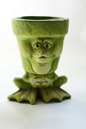 Green frog-like flowerpotの写真素材