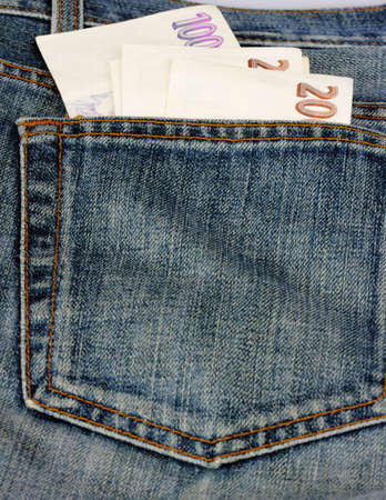 Czech money in pocket of jeans