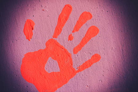Hand print on a wallの写真素材