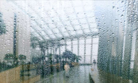 Background with rain drops close up. Rain drops on outdoor window, Closeup view transparent water...