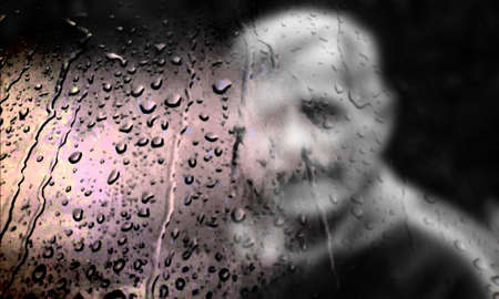 Background with rain drops close up. Rain drops on outdoor window, Closeup view transparent water drops on glass surface, humid water backdrop, blurred background with copy space for your textの写真素材