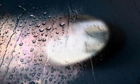 Background with rain drops close up. Rain drops on outdoor window, Closeup view transparent water drops on glass surface, humid water backdrop, blurred background with copy space for your textの写真素材