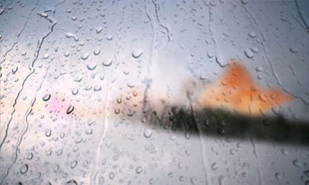 Background with rain drops close up. Rain drops on outdoor window, Closeup view transparent water drops on glass surface, humid water backdrop, blurred background with copy space for your textの写真素材