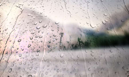 Background with rain drops close up. Rain drops on outdoor window, Closeup view transparent water drops on glass surface, humid water backdrop, blurred background with copy space for your textの写真素材