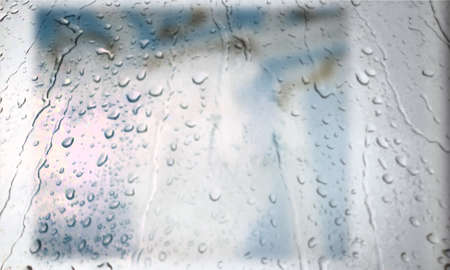 Background with rain drops close up. Rain drops on outdoor window, Closeup view transparent water drops on glass surface, humid water backdrop, blurred background with copy space for your textの写真素材