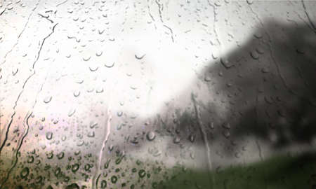 Background with rain drops close up. Rain drops on outdoor window, Closeup view transparent water drops on glass surface, humid water backdrop, blurred background with copy space for your textの写真素材