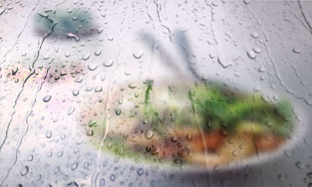 Background with rain drops close up. Rain drops on outdoor window, Closeup view transparent water drops on glass surface, humid water backdrop, blurred background with copy space for your textの写真素材