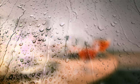 Background with rain drops close up. Rain drops on outdoor window, Closeup view transparent water drops on glass surface, humid water backdrop, blurred background with copy space for your textの写真素材