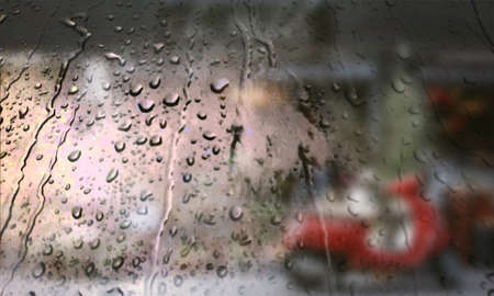 Background with rain drops close up. Rain drops on outdoor window, Closeup view transparent water...