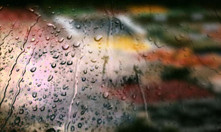 Background with rain drops close up. Rain drops on outdoor window, Closeup view transparent water...