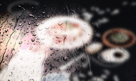 Background with rain drops close up. Rain drops on outdoor window, Closeup view transparent water drops on glass surface, humid water backdrop, blurred background with copy space for your textの写真素材