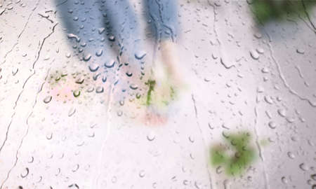 Background with rain drops close up. Rain drops on outdoor window, Closeup view transparent water drops on glass surface, humid water backdrop, blurred background with copy space for your textの写真素材