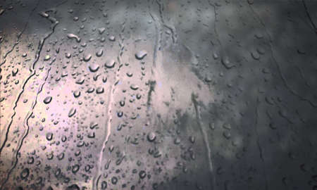 Background with rain drops close up. Rain drops on outdoor window, Closeup view transparent water drops on glass surface, humid water backdrop, blurred background with copy space for your textの写真素材