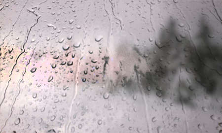 Background with rain drops close up. Rain drops on outdoor window, Closeup view transparent water drops on glass surface, humid water backdrop, blurred background with copy space for your textの写真素材