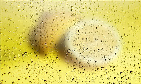 Background with rain drops close up. Rain drops on outdoor window, Closeup view transparent water drops on glass surface, humid water backdrop, blurred background with copy space for your textの写真素材