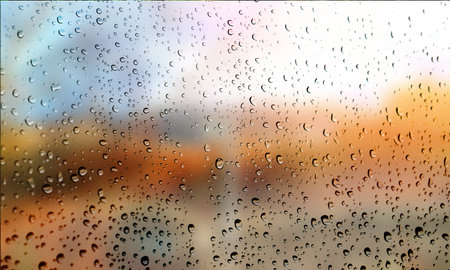 Background with rain drops close up. Rain drops on outdoor window, Closeup view transparent water drops on glass surface, humid water backdrop, blurred background with copy space for your textの写真素材